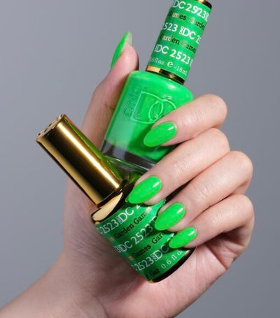 Hands wearing 2523 Garden Games Gel & Polish Duo by DND DC