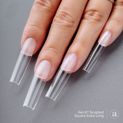 hands wearing Sculpted Extra Long Square 2.0 Gel-X Tips by Apres