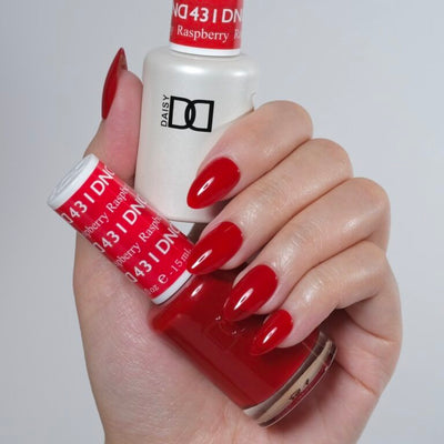hands wearing 431 Raspberry Gel Polish by DND