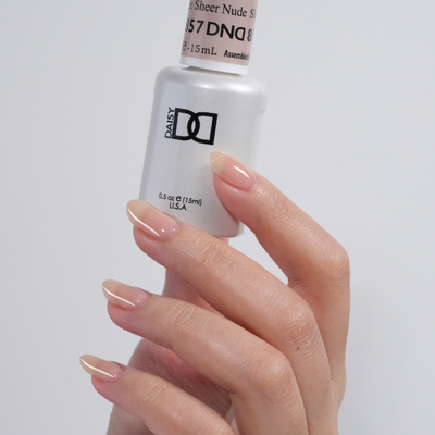 hands wearing DND Gel Polish - 857 Sheer Nude