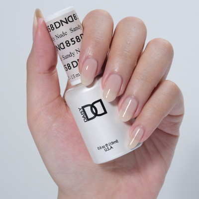 hands wearing DND Gel Polish - 858 Sandy Nude