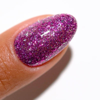 finger wearing DND Gel Polish - 920 Magenta Aura