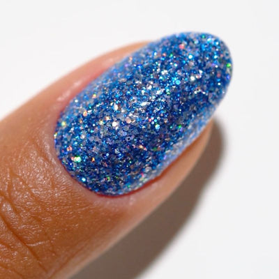 finger wearing DND Gel Polish - 927 Blue Illusion