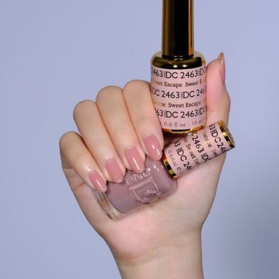 hands wearing 2463 Sweet Escape Gel & Polish Duo by DND DC