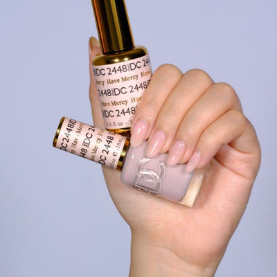 hands wearing 2448 Have Mercy Gel & Polish Duo by DND DC