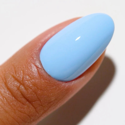 Hands wearing DND DC Gel 2535 Surfs Up