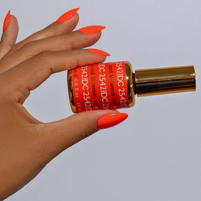 Hands wearing DND DC Gel 2542 Untamed