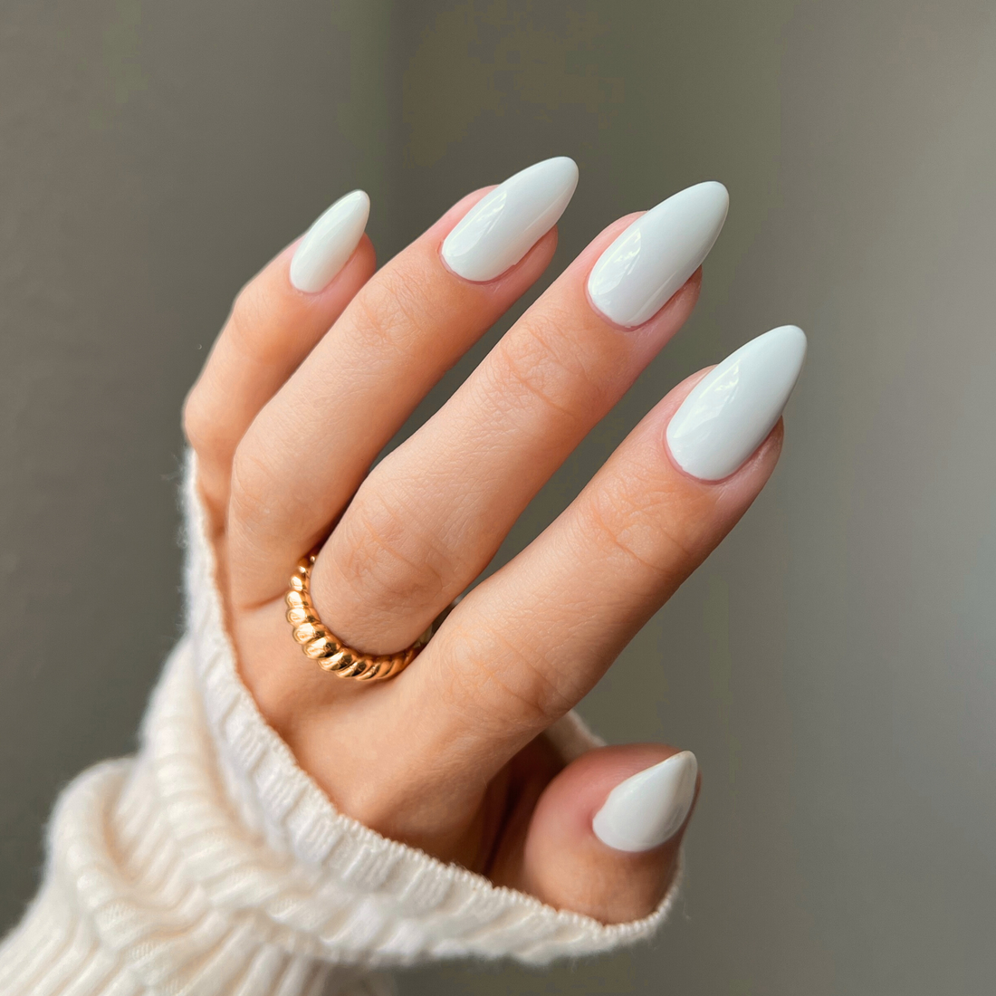 Hands wearing DND Diva 038 Smokey White