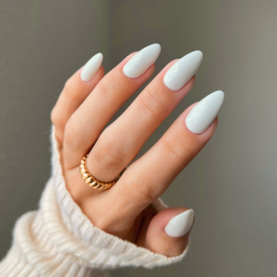 Hands wearing DND Diva 038 Smokey White