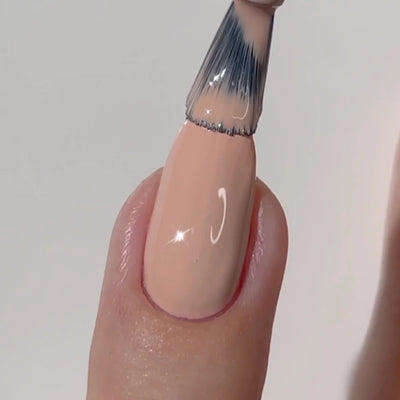 finger wearing DND Diva Gel - 050 Pinky Nude