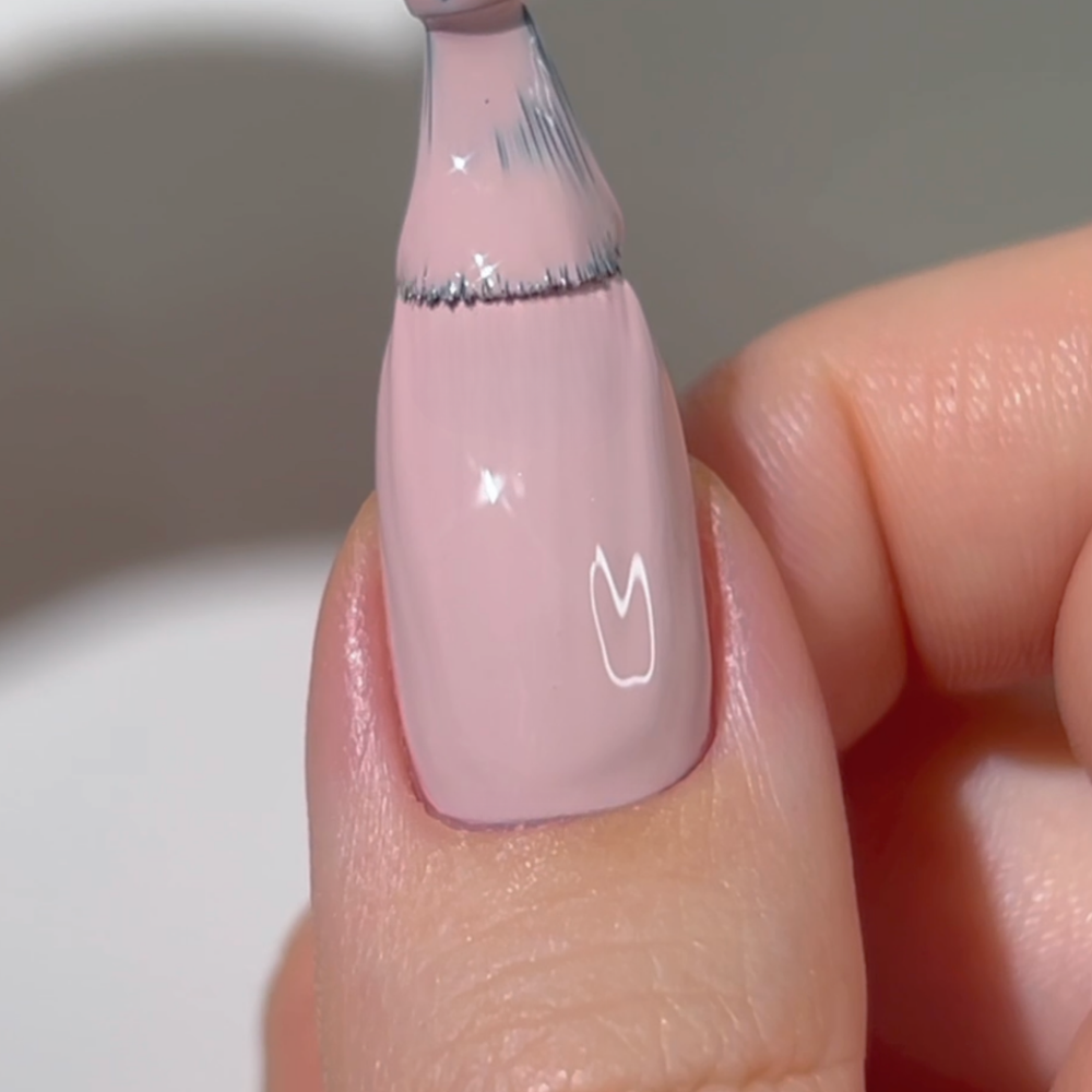 finger wearing DND Diva 063 Shortbread