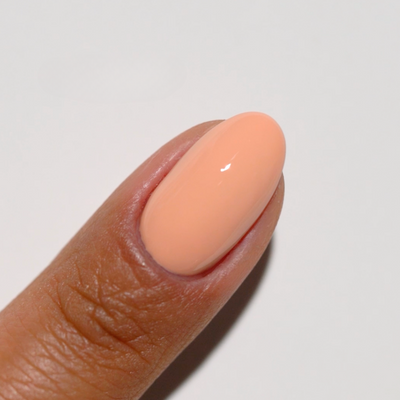 finger wearing DND Diva Toasted Apricot