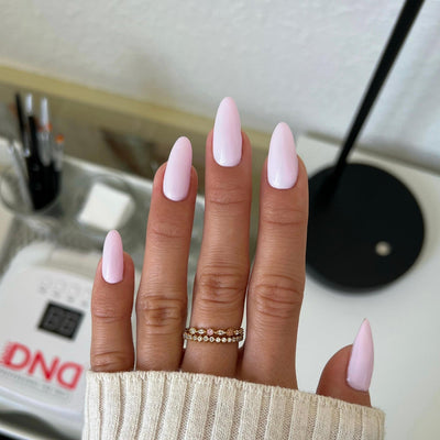 hands wearing color swatch for DND Diva 096 Morphed Unicorn
