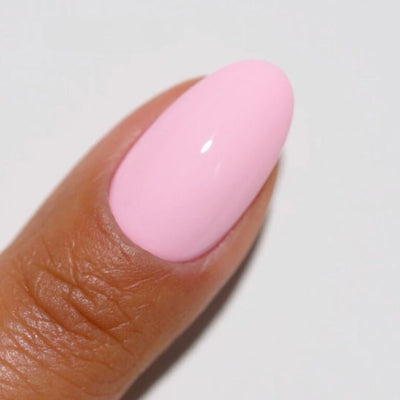 finger wearing 112 Sugared Rose Gel & Polish Diva Duo by DND