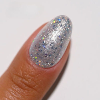 hands wearing 20 Meet On The Dancefloor Gel & Polish Diva Duo by DND