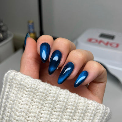 hands wearing DND Diva Loyal To You Glassball 9D Cat Eye