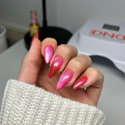 hands wearing DND Diva 'Hi, Kitty!' Candy 9D Cat Eye