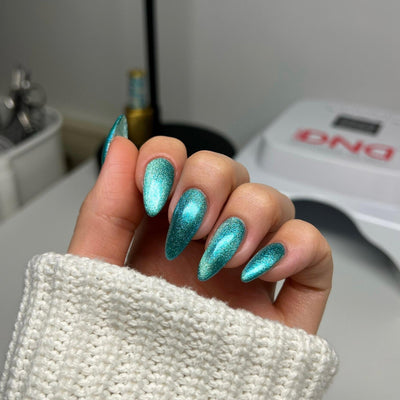 hands wearing DND Diva Saltwater Tabby Candy 9D Cat Eye