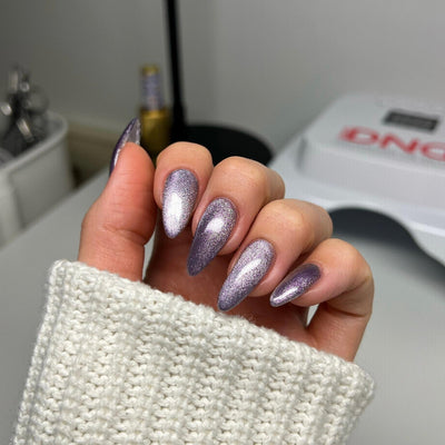 hands wearing DND Diva 'Wild Berry' Candy 9D Cat Eye