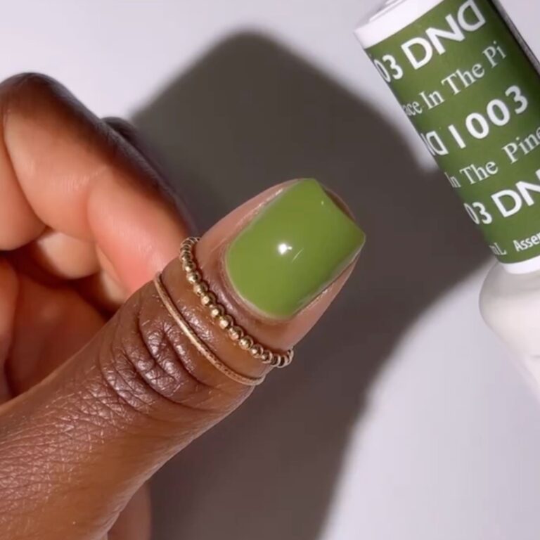 hands wearing 1003 Peace In The Pines Gel Polish by DND