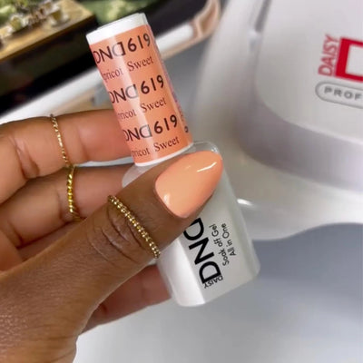 hand wearing dnd gel polish 619 Sweet Apricot
