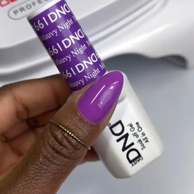hands wearing DND Duo gel polish 661 Mauvy Night