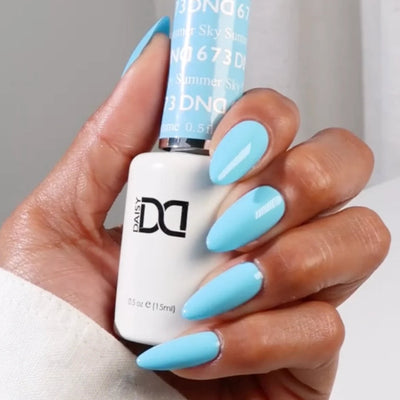 hands wearing DND Duo gel polish 673 Summer Sky