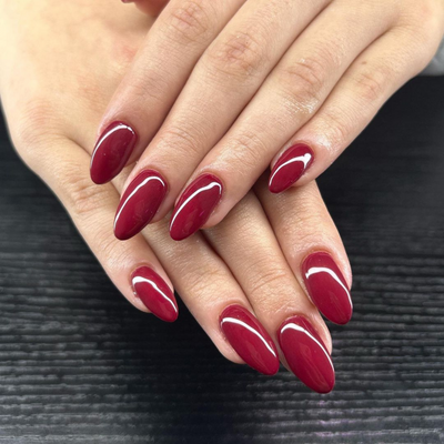 hands wearing DND Gel Polish - 754 Winter Berry