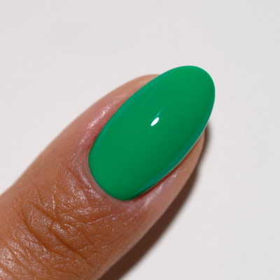 finger wearing DND Gel Polish 790 Green Divine