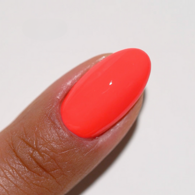 finger wearing DND Gel Polish 811 Guava