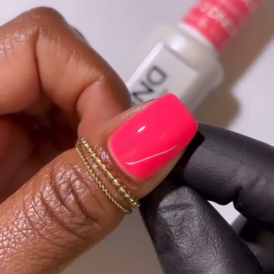 finger wearing DND Gel Polish 812 Sweet Tooth