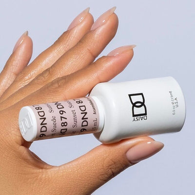 hands wearing 879 Sunset Suede Gel Polish by DND