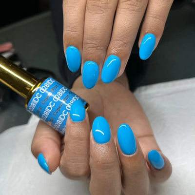 hands wearing DND DC Gel - 028 Copen Blue