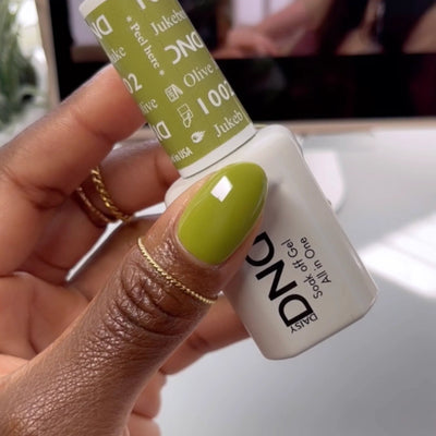 finger wearing DND Gel Polish - 1002 Jukebox Olive