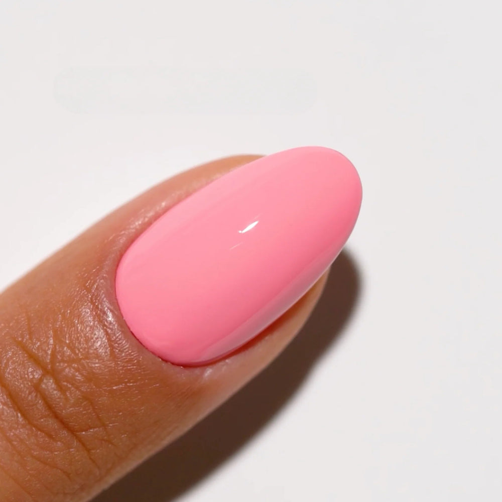 finger wearing DND Gel Polish - 722 Strawberry Cheesecake