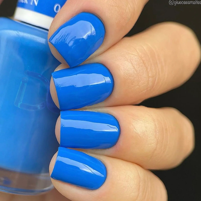 hands wearing DND Gel Polish 794 Rock n Blue