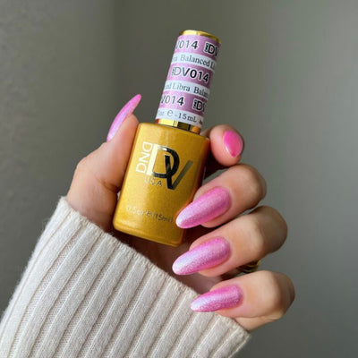 hands wearing 14 Balanced Libra Gel & Polish Diva Duo by DND