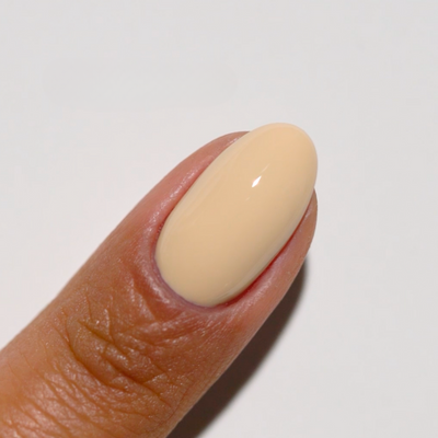 finger wearing DND Diva Gel - 052 Biscuits N Honey