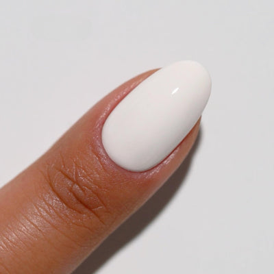 finger wearing color swatch for DND Diva 074 Creampuff