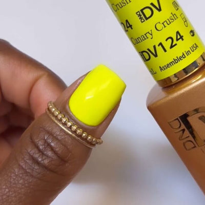 hands wearing 124 Canary Crush Diva Gel & Polish Duo by DND