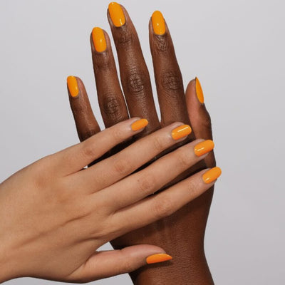 hand wearing 207 Sunset Creamsicle Gel & Polish Diva Duo by DND (2)