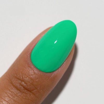 finger wearing 221 Aloha Diva Gel & Polish Duo by DND