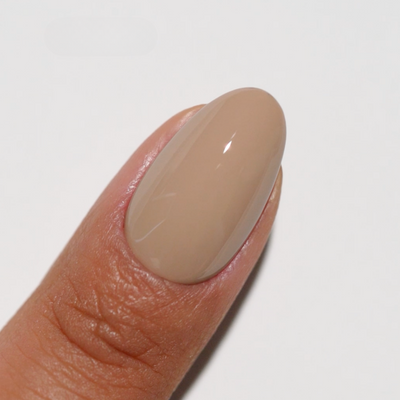 hands wearing Nude Mocha 266 Diva Gel & Polish Duo by DND
