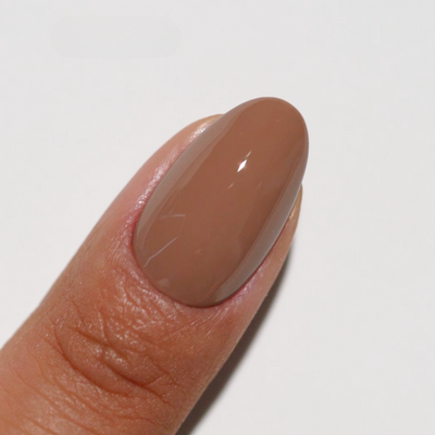 hands wearing Almond Toffee 267 Diva Gel & Polish Duo by DND