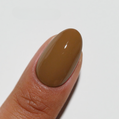 finger wearing Chocolate Therapy 269 Diva Gel & Polish Duo by DND