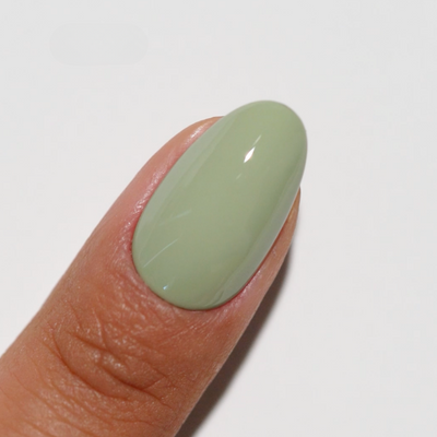 finger wearing Foggy Fern 277 Diva Gel & Polish Duo by DND
