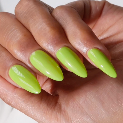 hands wearing Salsa Verde 280 Diva Gel & Polish Duo by DND