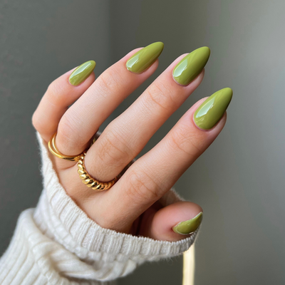 hands wearing Collard Greens 281 Diva Gel & Polish Duo by DND