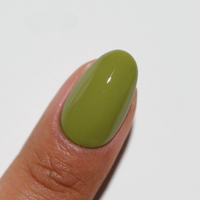 finger wearing Dirty Martini 282 Diva Gel & Polish Duo by DND