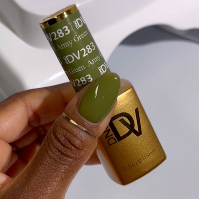 hands wearing Army Green 283 Diva Gel & Polish Duo by DND